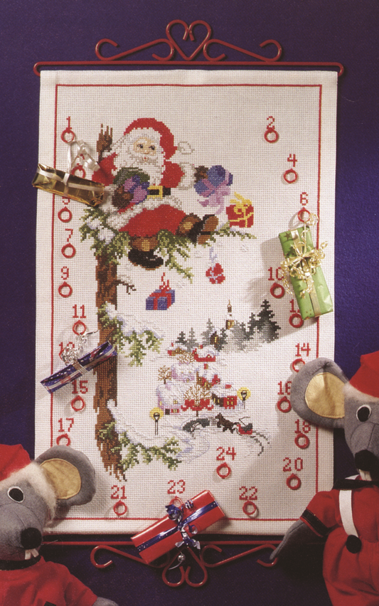 Broderijulekalender med julemand i træ
